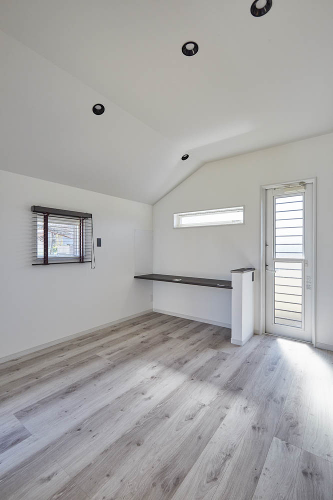 庭へのアプローチを楽しむ家