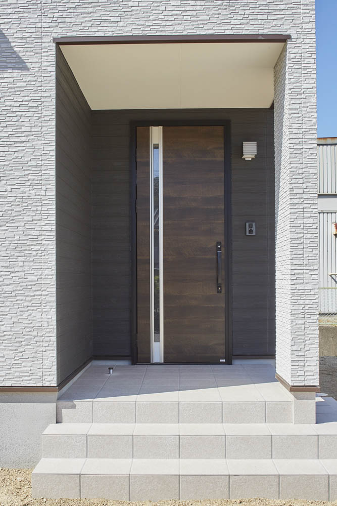 庭へのアプローチを楽しむ家