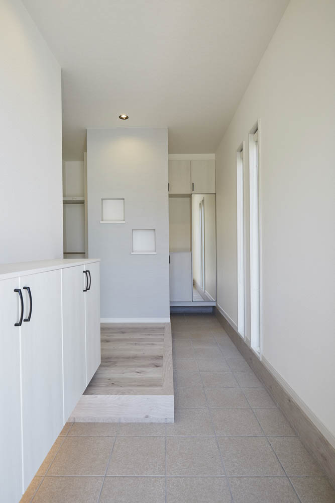 庭へのアプローチを楽しむ家