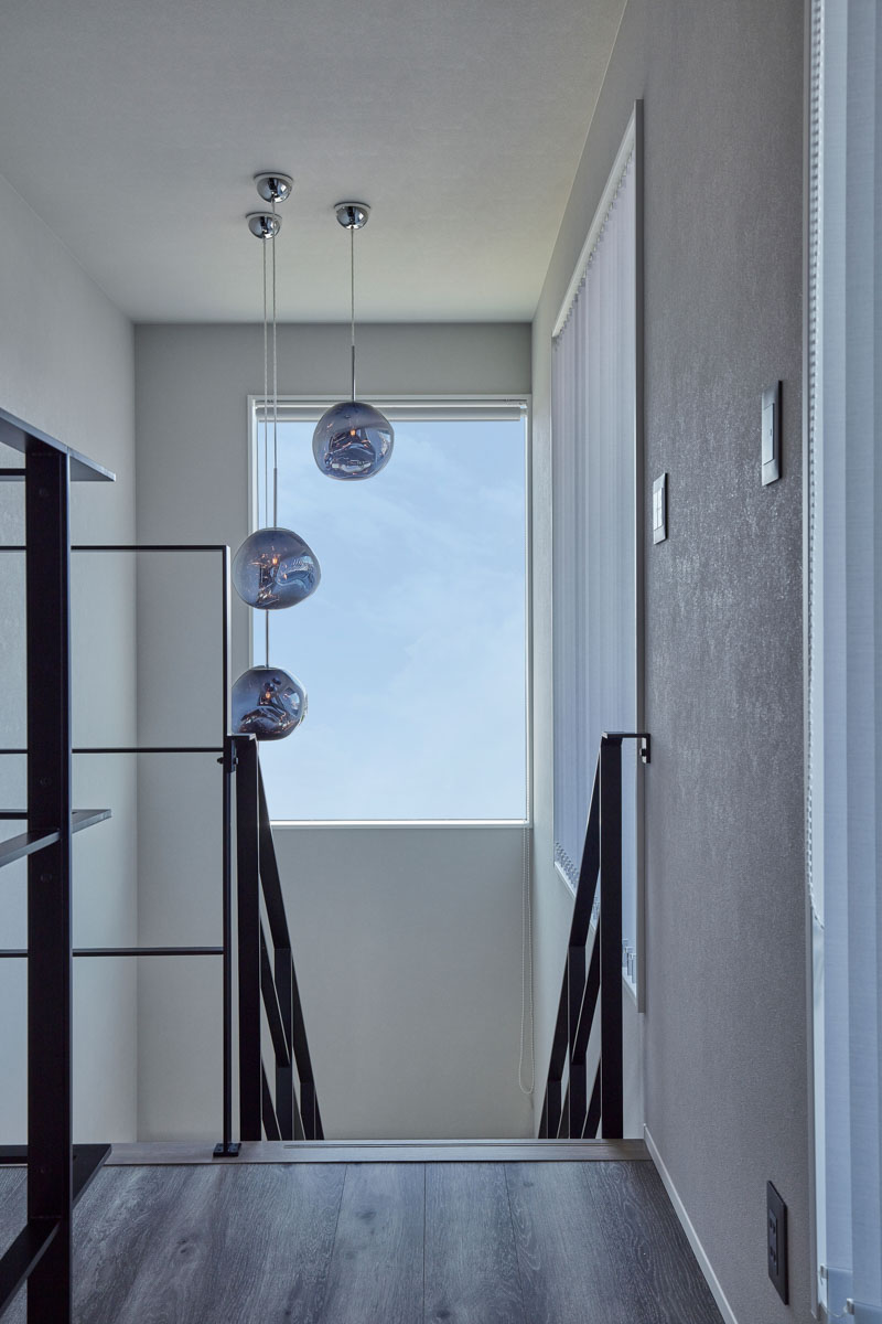 塗り壁と吹き抜けの家