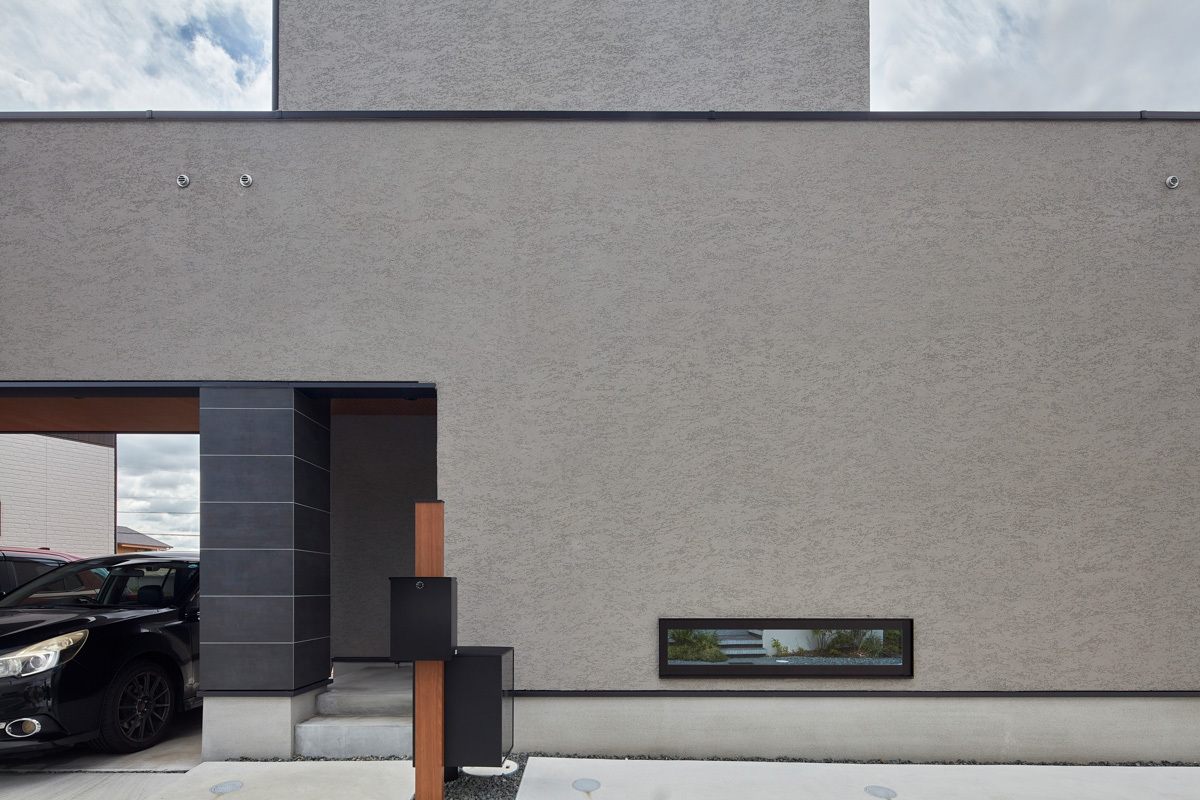 アプローチゲートのあるデザインハウス